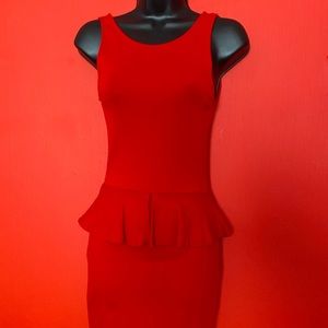 Pretty Little Red Dress is sleeveless and form fitting